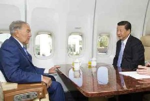 习近平与哈总统同吃咸菜米粥 就着清茶谈国事