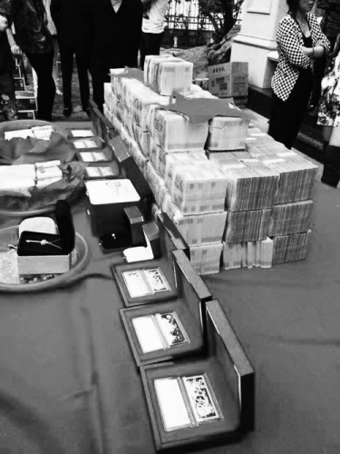 浙江台州土豪娶妻引侧目：288万现钞金条十几根