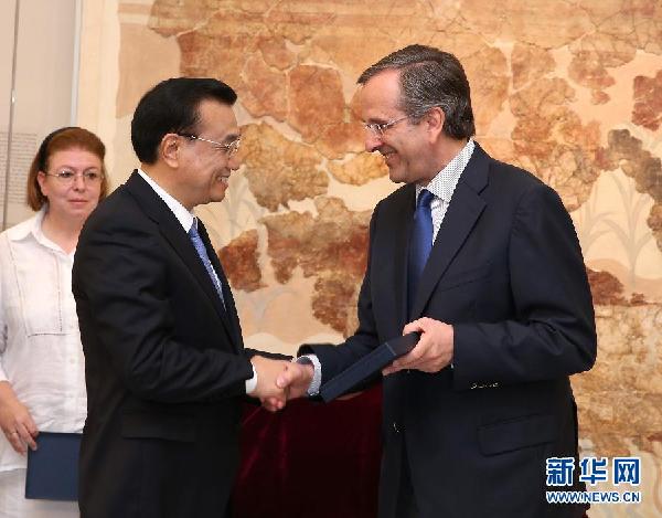 6月21日，国务院总理李克强与希腊总理萨马拉斯共同出席希腊伊拉克利翁博物馆新馆开馆仪式并发表讲话。 新华社记者 庞兴雷 摄