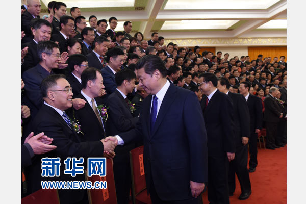 1月9日，2014年度国家科学技术奖励大会在北京人民大会堂隆重举行。这是奖励大会开始前，习近平等党和国家领导人会见国家科学技术奖获奖代表。新华社记者 李学仁 摄