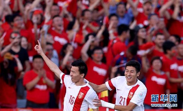 （亚洲杯·体坛聚焦）足球——中国队小组赛三连胜