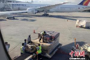 菲律宾台风遇难者近四千 总统称将蹲守重灾区