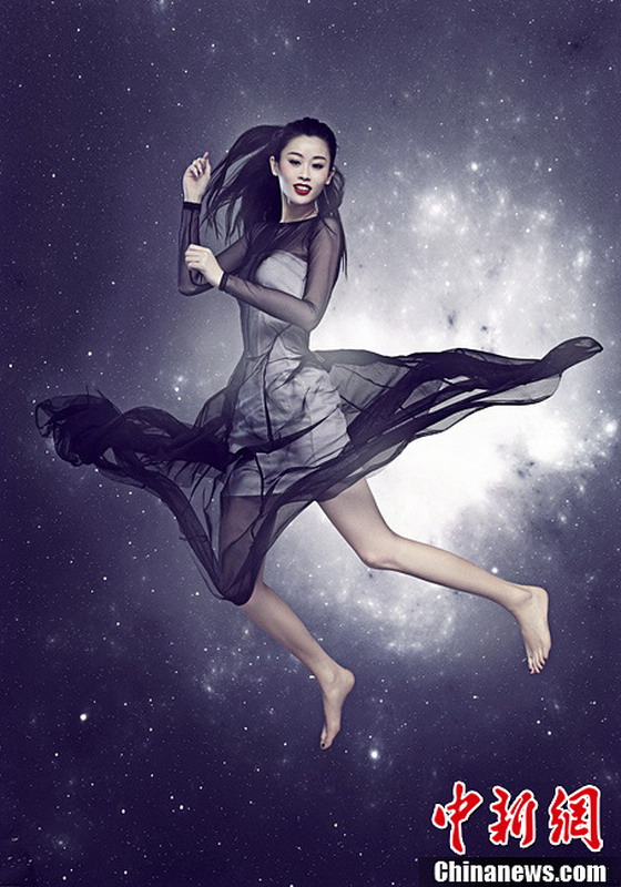 图为2013世界小姐中国区总决赛冠军直通赛佳丽——邹明月。