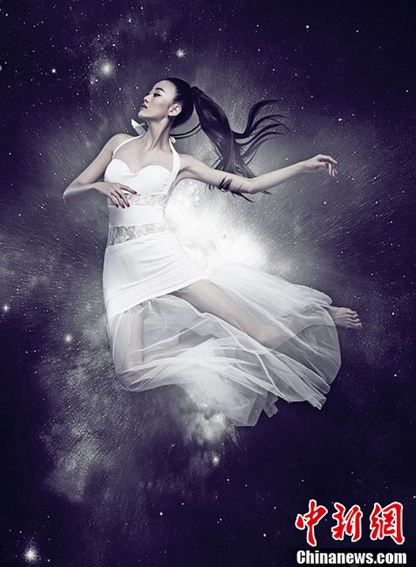 图为2013世界小姐中国区总决赛冠军直通赛佳丽——刘潇。