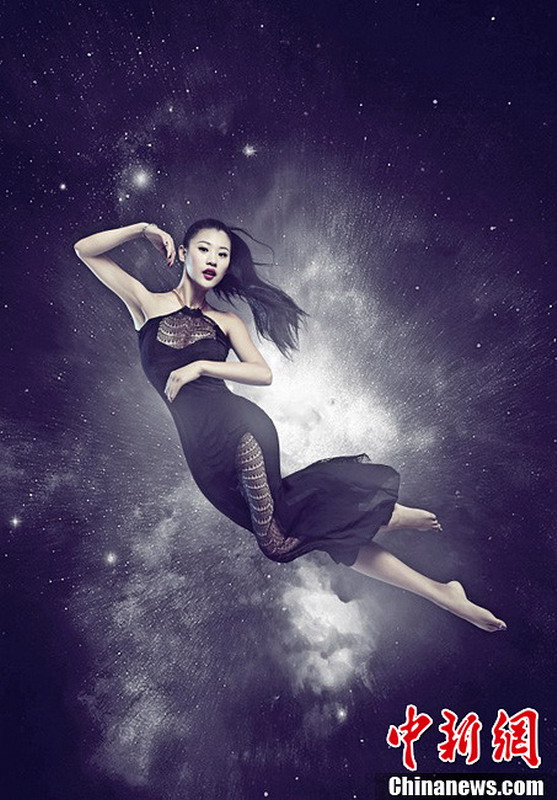 图为2013世界小姐中国区总决赛冠军直通赛佳丽——许微。