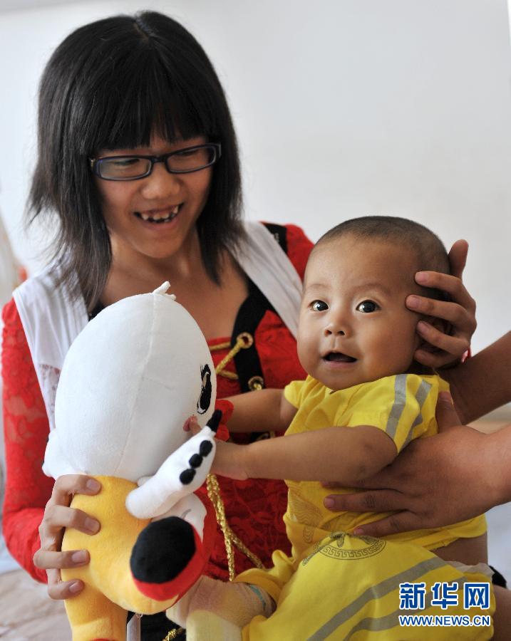 （社会）（2）中国首例儿童肝移植患者已健康生存14年