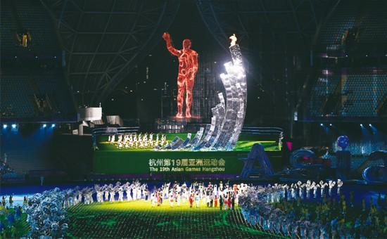 党的十八大以来,在<span class="highlight_review" data-suggest="" id="highlight_review_1"><span class="highlight_review" data-suggest="" id="highlight_review_5"><span class="highlight_review" data-suggest="" id="highlight_review_10"><span class="highlight_review" data-suggest="" id="highlight_review_14"><span class="highlight_review" data-suggest="" id="highlight_review_15"><span class="highlight_review" data-suggest="" id="highlight_review_21"><span class="highlight_review" data-suggest="" id="highlight_review_22"><span class="highlight_review" data-suggest="" id="highlight_review_23"><span class="highlight_review" data-suggest="" id="highlight_review_28"><span class="highlight_review" data-suggest="" id="highlight_review_29"><span class="highlight_review" data-suggest="" id="highlight_review_30"><span class="highlight_review" data-suggest="" id="highlight_review_31"><span class="highlight_review" data-suggest="" id="highlight_review_37"><span class="highlight_review" data-suggest="" id="highlight_review_42">习近平</span></span></span></span></span></span></span></span></span></span></span></span></span></span>新时代中国特色社会主义思想指引下,我国各项事业取得历史性成就<span class="highlight_review" data-suggest="" id="highlight_review_20"><span class="highlight_review" data-suggest="" id="highlight_review_24"><span class="highlight_review" data-suggest="" id="highlight_review_25"><span class="highlight_review" data-suggest="" id="highlight_review_26"><span class="highlight_review" data-suggest="" id="highlight_review_27"><span class="highlight_review" data-suggest="" id="highlight_review_36"><span class="highlight_review" data-suggest="" id="highlight_review_38">、</span></span></span></span></span></span></span>发生历史性变革。在刚刚闭幕的杭州第19届亚洲运动会上,从首创“亚运数字火炬手”到推出电子身份注册卡<span class="highlight_review" data-suggest="" id="highlight_review_20"><span class="highlight_review" data-suggest="" id="highlight_review_24"><span class="highlight_review" data-suggest="" id="highlight_review_25"><span class="highlight_review" data-suggest="" id="highlight_review_26"><span class="highlight_review" data-suggest="" id="highlight_review_27"><span class="highlight_review" data-suggest="" id="highlight_review_36"><span class="highlight_review" data-suggest="" id="highlight_review_38">、</span></span></span></span></span></span></span>探索使用5.5G新技术……数字赋能<span class="highlight_review" data-suggest="" id="highlight_review_20"><span class="highlight_review" data-suggest="" id="highlight_review_24"><span class="highlight_review" data-suggest="" id="highlight_review_25"><span class="highlight_review" data-suggest="" id="highlight_review_26"><span class="highlight_review" data-suggest="" id="highlight_review_27"><span class="highlight_review" data-suggest="" id="highlight_review_36"><span class="highlight_review" data-suggest="" id="highlight_review_38">、</span></span></span></span></span></span></span>科技助力,让世界看到了中国的科技实力和东方文化的魅力。图为2023年10月8日,在杭州亚运会闭幕式上,数字火炬手“弄潮儿”向现场观众挥手致意。 新华社记者 王鹏/摄